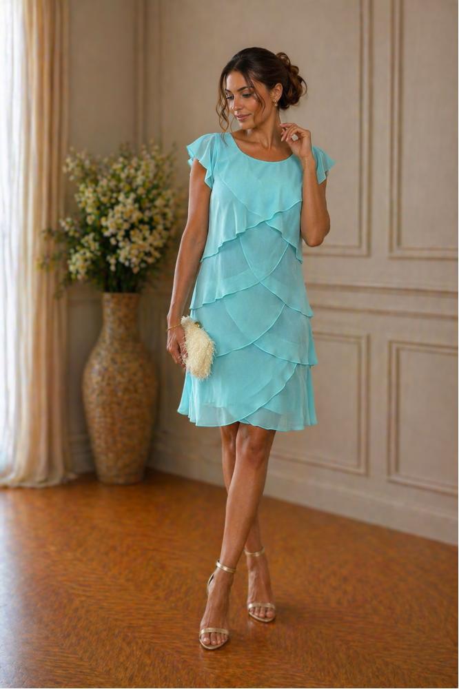 Ľahké volánové mentolové šaty na svadbu
